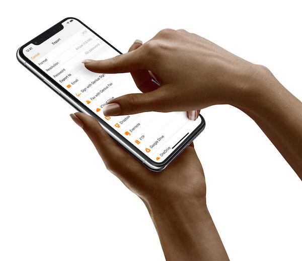 A person selecting an option from the Genius Scan menu.